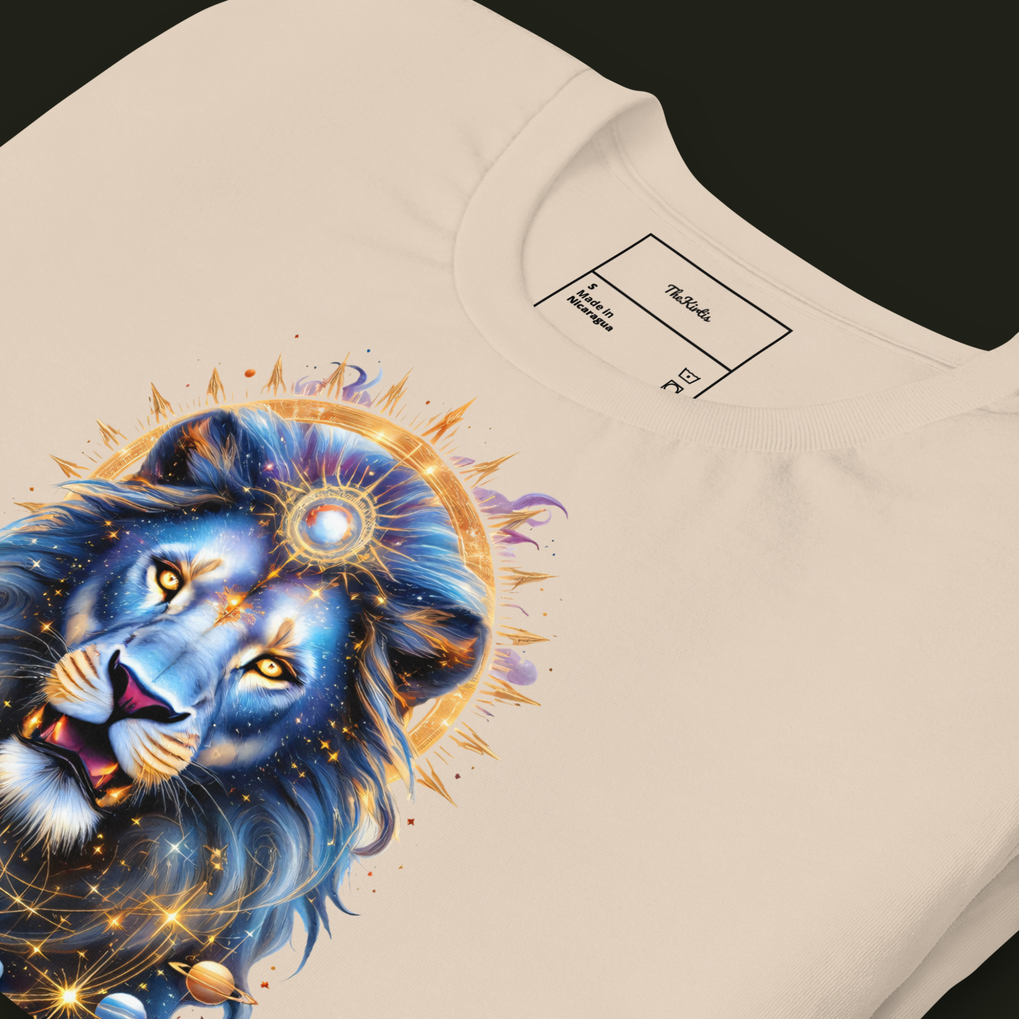 Close-up of the Celestial Guardian artwork on a soft cream unisex t-shirt highlighting the lion's face, celestial halo and intricate cosmic details.