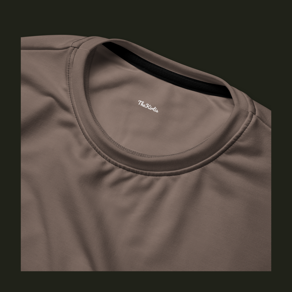 Close-up of the Cessavyr recycled sweatshirt neckline in muted warm taupe, showing the crew neck stitching and TheKirtis inner neck print.
