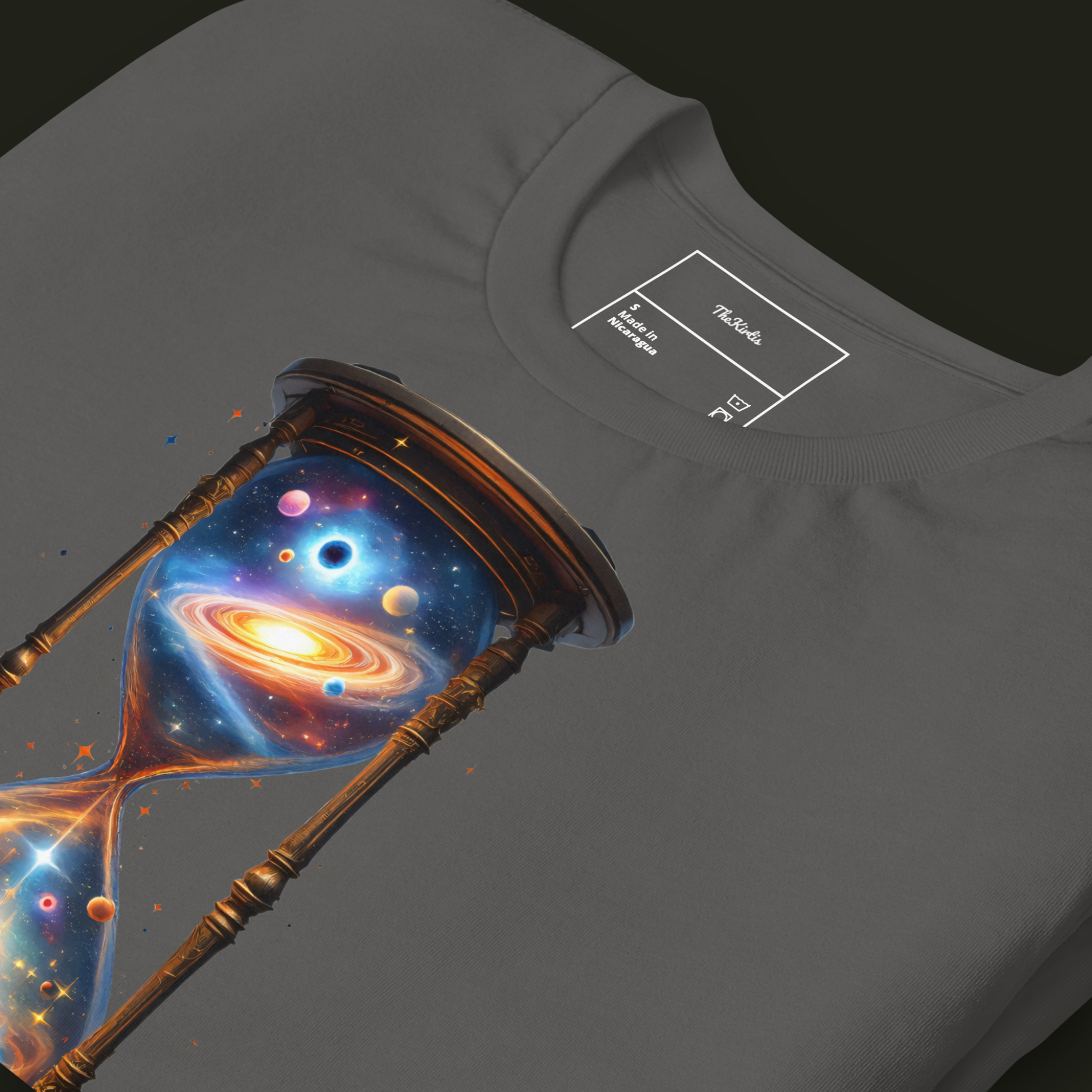 Close-up of the Cosmic Hourglass artwork on an asphalt unisex t-shirt showing the galaxy and planets inside the hourglass.