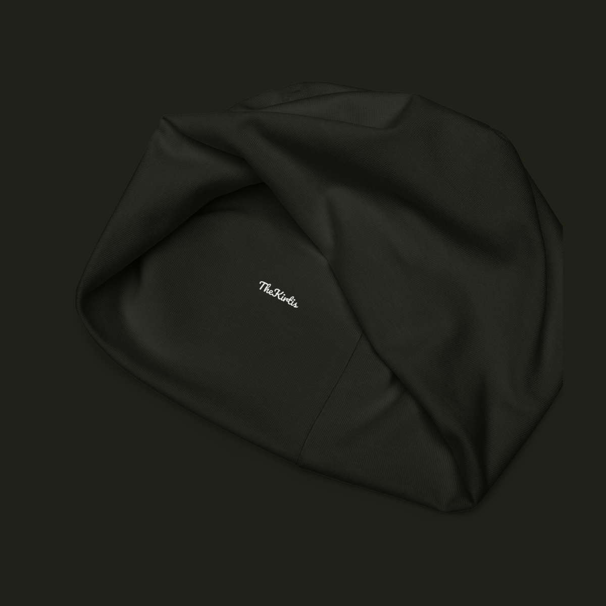 Inside view of the Dornavyn unisex beanie showing the TheKirtis label, dark fabric texture and interior seam construction.