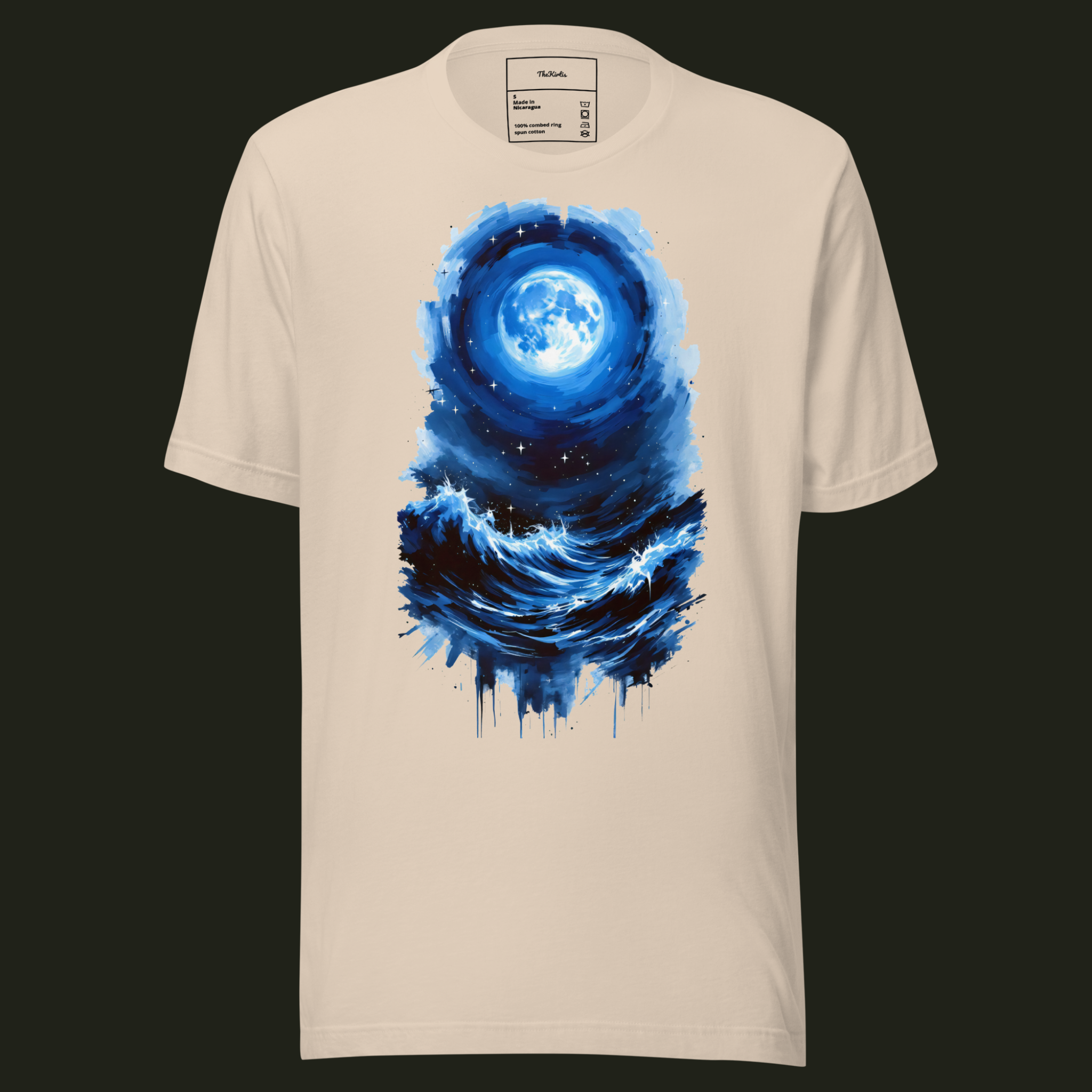 Lunar Tide unisex t-shirt in soft cream featuring a luminous blue full moon above rolling ocean waves beneath a star-filled night sky.