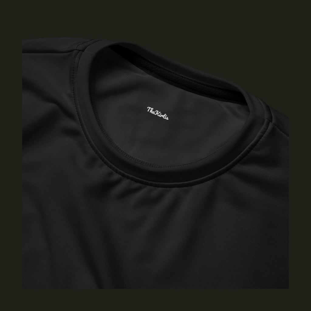 Close-up of the Norev recycled sweatshirt neckline in near-black charcoal, showing the crew neck stitching and TheKirtis inner neck print.