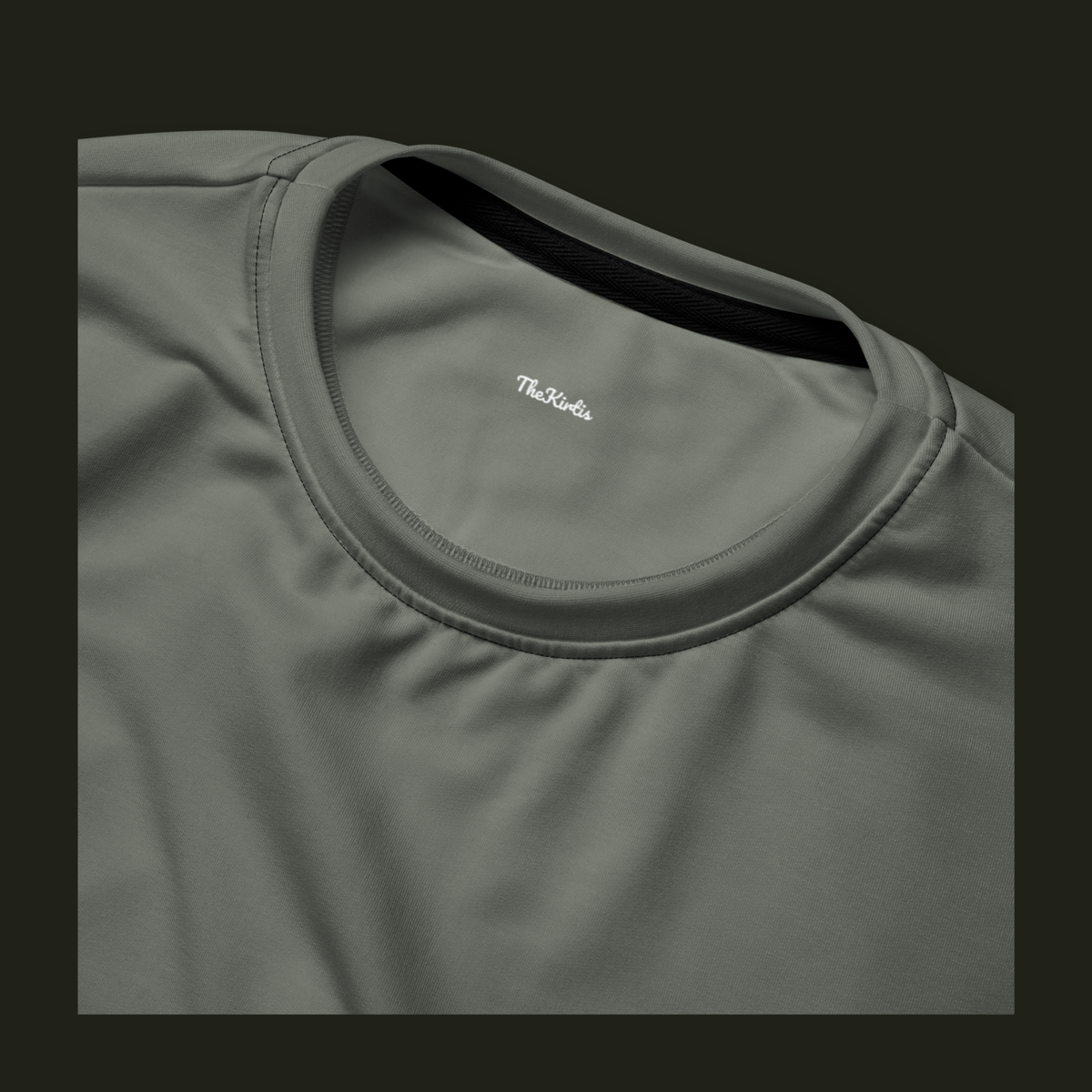 Close-up of the Talyvess recycled sweatshirt neckline in soft olive-grey, showing the crew neck stitching and TheKirtis inner neck print.