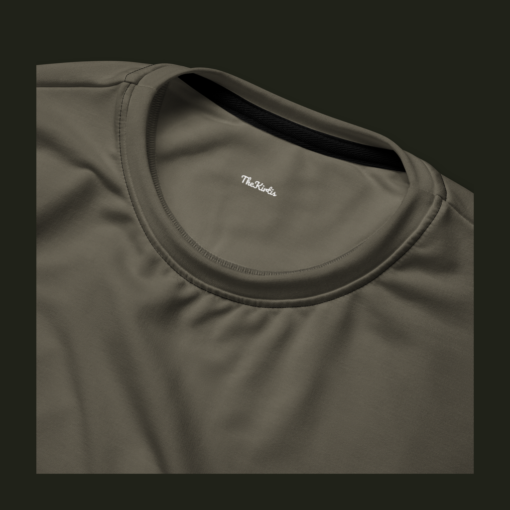 Close-up of the Tauraveth recycled sweatshirt neckline in muted taupe-grey, showing the crew neck stitching and TheKirtis inner neck print.