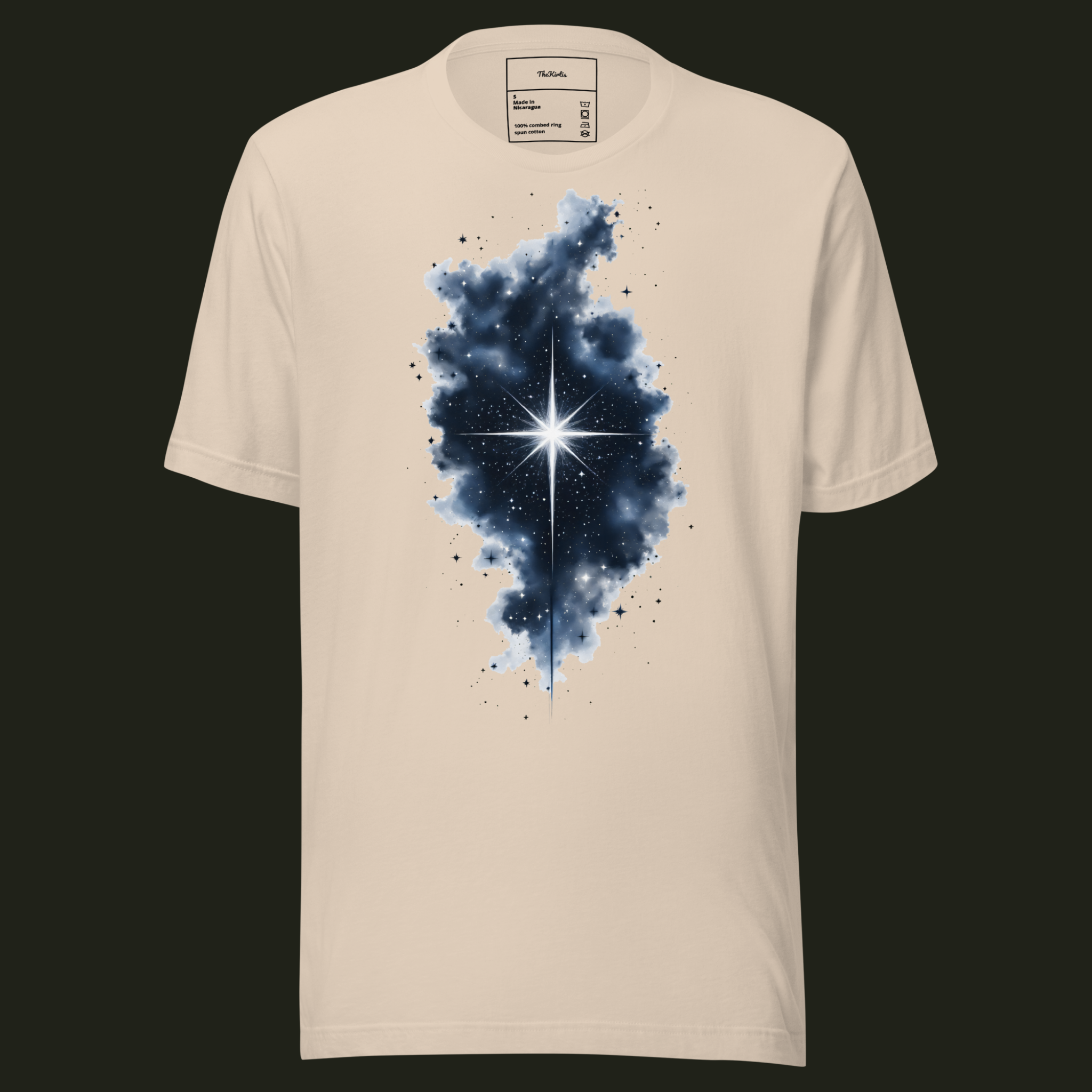 Within the Darkness unisex t-shirt in soft cream featuring a radiant white star surrounded by a dark nebula and scattered stars.